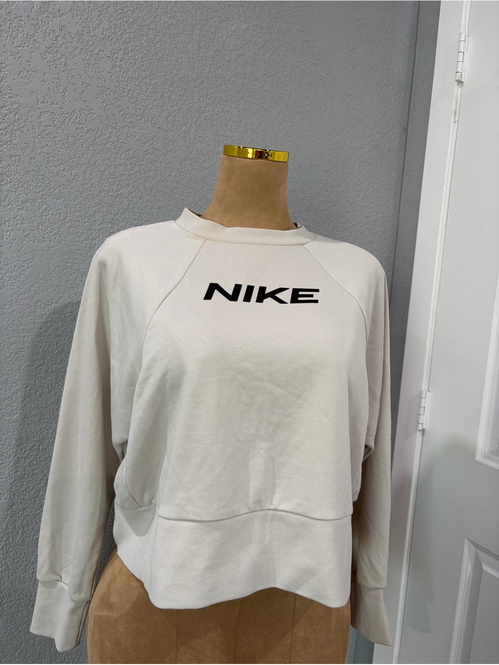 Nike Women's Off-White Crewneck Sweatshirt with Black Logo